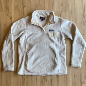 Off white Patagonia sweater.